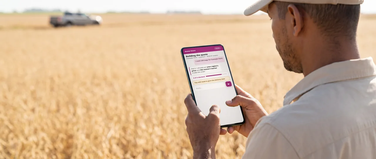 Field rep in a cap and field shirt holds a phone on a farm; the screen shows the chat where the quote is being built.